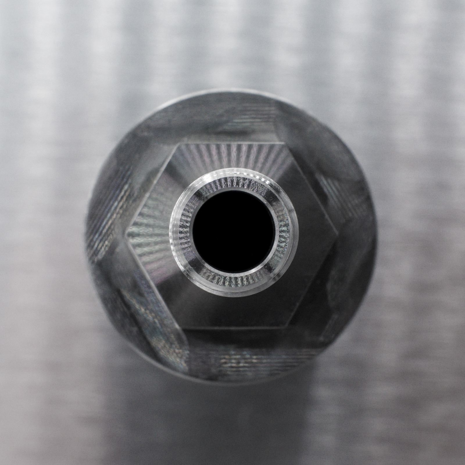Front-facing detail of a machined part representing critical stock availability.